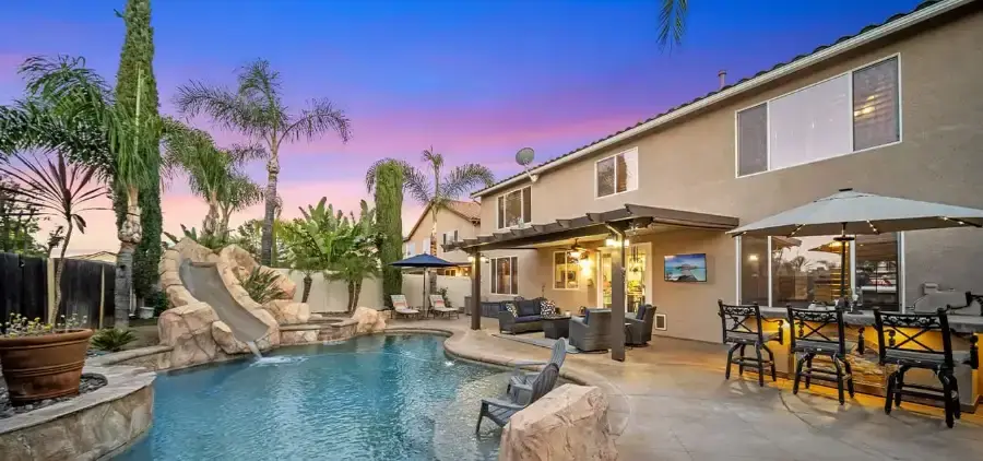Backyard pool and covered patio at 26195 Castle Lane, Murrieta
